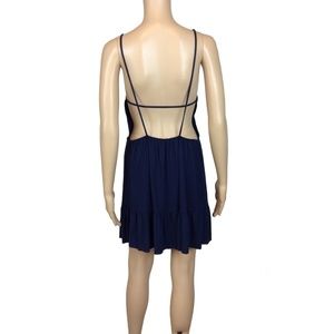 NWOT Open back caged ruffle hem dress